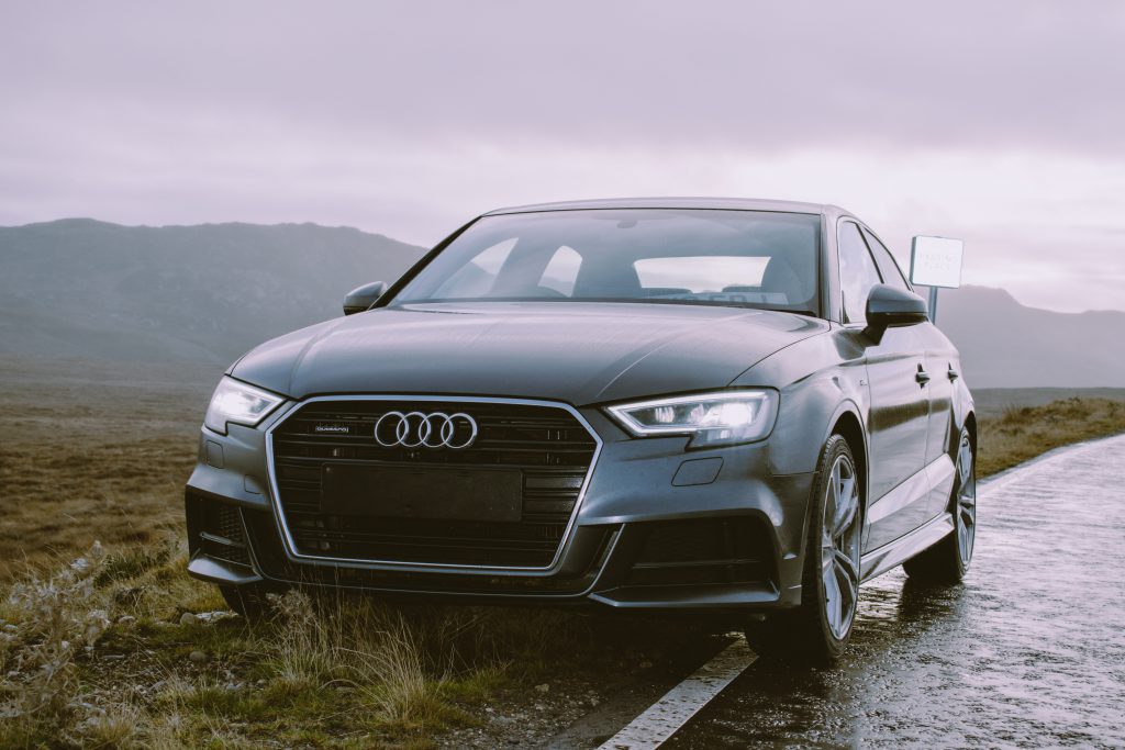 An Audi A3 pulled off the side of the road