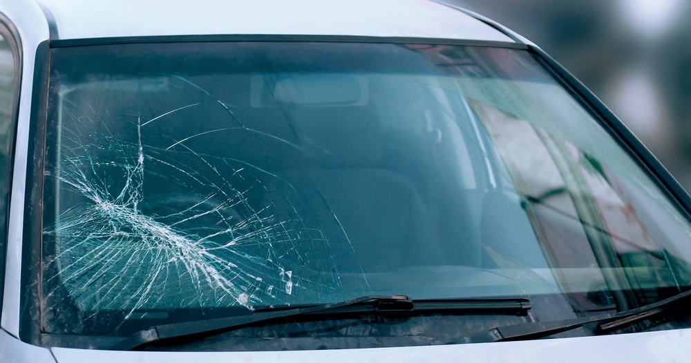 Car glass windscreen crack spreading further on a windscreen