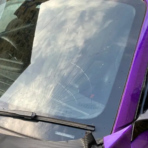 Spiderweb stone chip crack on windscreen